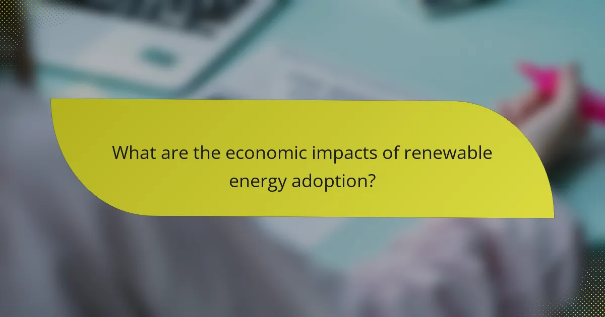 What are the economic impacts of renewable energy adoption?